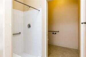 bathroom with shower inside suite at 5402 Holly Rd. Suite 2102