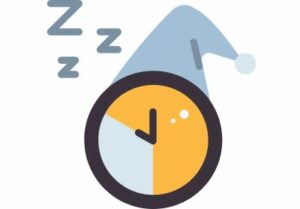 A cartoon image of an alarm clock wearing a night cap.